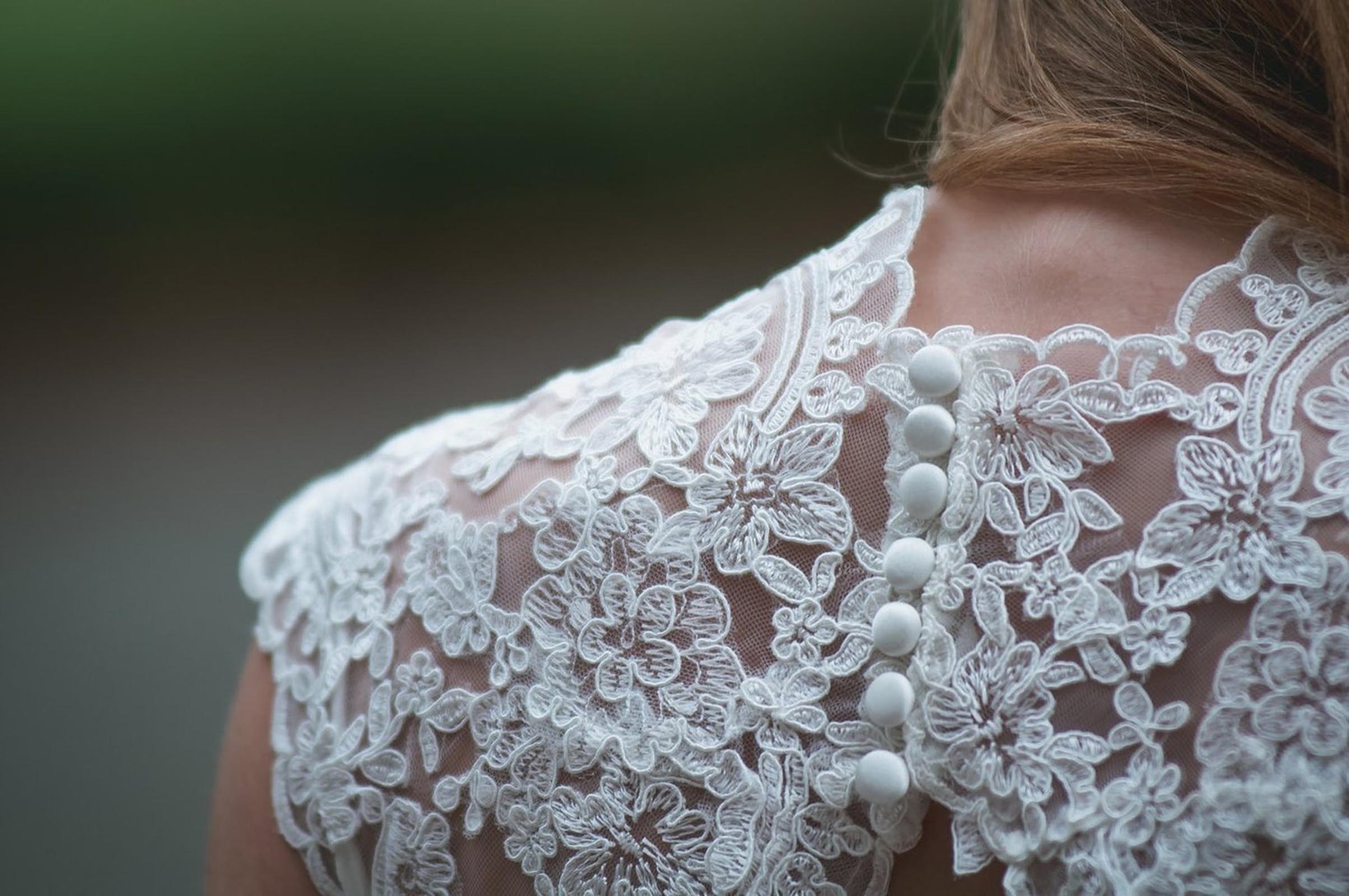 Back of lace dress on bride